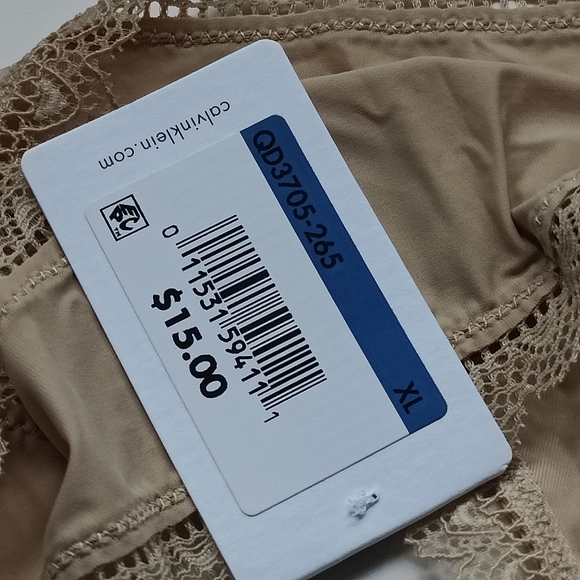 NWT CALVIN KLEIN FLIRTY MICRO THONG PANTY IN DESERT SIZE EXTRA LARGE - Picture 4 of 5